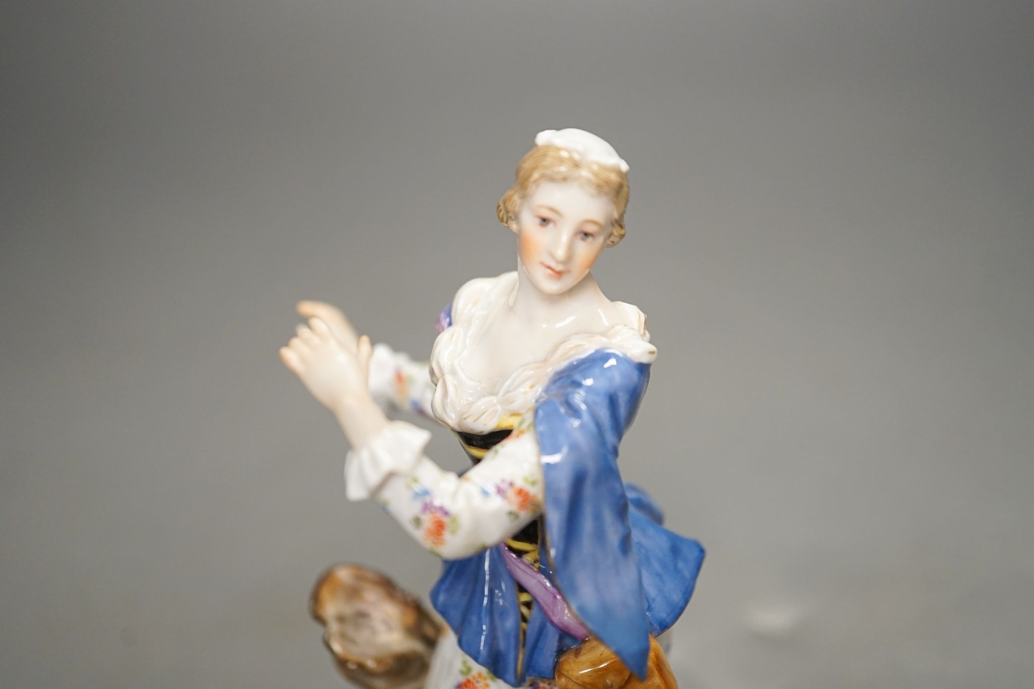 A Meissen figure of a lady, incised model 1984. 18cm tall